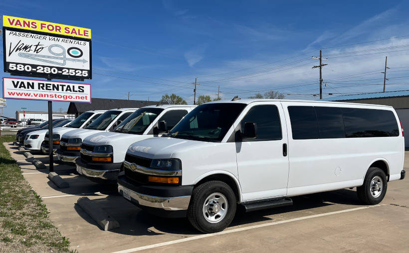 Large white vans at Vans to Go