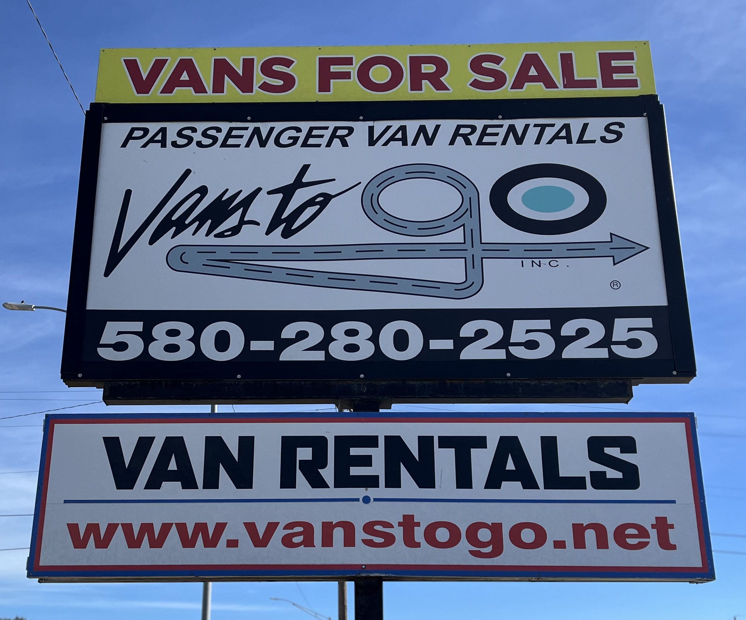vans-sign-bluesky Sign reading vans for sale, passenger van rentals, 580-280-2525, van rentals